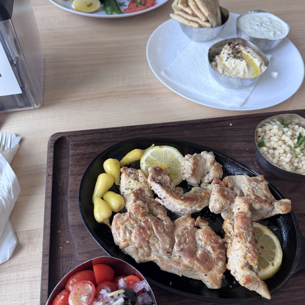 Picasso Taqueria & Mediterranean - Chicken plate with couscous, greek salad and dip platter - Mediterranean Near Me - Mooresville, North Carolina Picasso Taqueria & Mediterranean - Chicken plate with couscous, greek salad and dip platter - Mediterranean Near Me - Mooresville, North Carolina