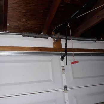 Garage Doors 4 Less - This is the pic I sent him of the broken spring. - Garage Door Services Near Me - Phoenix, Arizona Garage Doors 4 Less - This is the pic I sent him of the broken spring. - Garage Door Services Near Me - Phoenix, Arizona