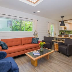 Shift Vacation Rentals - Front Break, open living, dining and kitchen area.