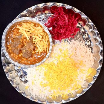 Caspian Kababs - Gheymeh is a flavorful Iranian stew made with tender beef , split peas, and dried limes, simmered in a saffron-tomato sauce. It is served wi - Mediterranean Near Me - Edmonton, Alberta