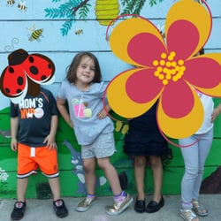 All Saints Learning Center - The murals are typical of the school. Bright and cheerful