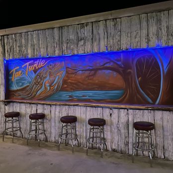 Tan Turtle Tavern - Beautiful painting and opening sitting near stage - Rest Stops Near Me - New Braunfels, Texas Tan Turtle Tavern - Beautiful painting and opening sitting near stage - Rest Stops Near Me - New Braunfels, Texas
