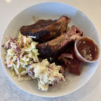 Neighbor Tim's BBQ - Ribs with sauce, coleslaw and potato salad with burnt ends. - Barbeque Near Me - Boise, Idaho Neighbor Tim's BBQ - Ribs with sauce, coleslaw and potato salad with burnt ends. - Barbeque Near Me - Boise, Idaho