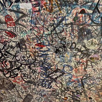 The Sink - The ceiling above our both autographed by each graduating class from CU. - Pizza Near Me - Boulder, Colorado