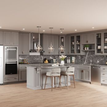 Captivated Cabinets - a kitchen with a center island - General Contractors Near Me - Cape Coral, Florida Captivated Cabinets - a kitchen with a center island - General Contractors Near Me - Cape Coral, Florida