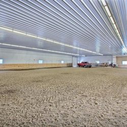 Red River Equestrian Center - Insulated, bright and large indoor arena for year round riding in comfort