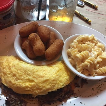 The Hideaway - Pulled pork omelette with macaroni and cheese and hush puppies - Sports Bars Near Me - Odenton, Maryland The Hideaway - Pulled pork omelette with macaroni and cheese and hush puppies - Sports Bars Near Me - Odenton, Maryland