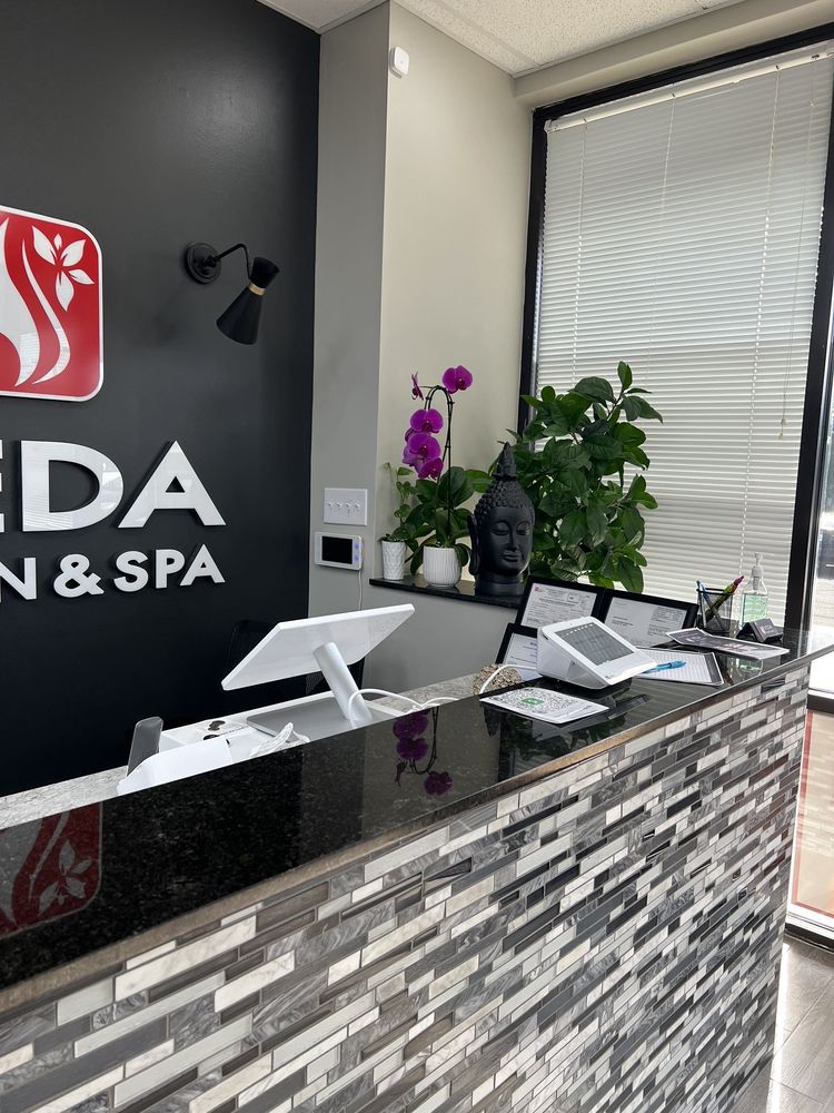 Veda Salon & Spa Logo