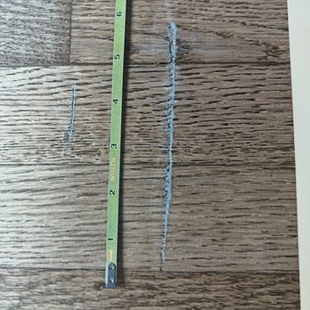 Austin's Moving Company - 4,5 inch gash in 90 year old floor. - Movers Near Me