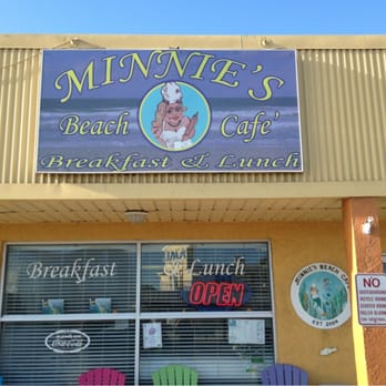 Minnie's Beach Cafe - The front of Minnie's is welcoming with several plastic beach chairs for waiting. - American Near Me - Holmes Beach, Florida Minnie's Beach Cafe - The front of Minnie's is welcoming with several plastic beach chairs for waiting. - American Near Me - Holmes Beach, Florida
