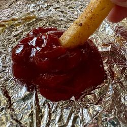 Cook Out - Cajun Fry dipped in Heinz Ketchup.