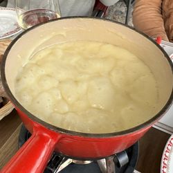 La Barca - Fondue is served with boiled potatoes and stale bread.