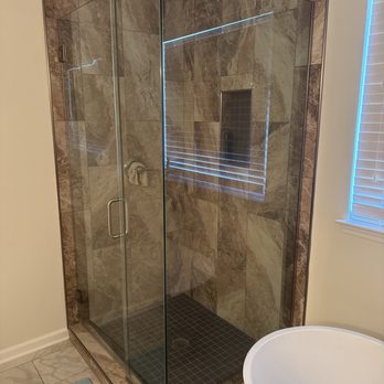 Two Rivers Built - Rain shower with wall and floor tile. - General Contractors Near Me Two Rivers Built - Rain shower with wall and floor tile. - General Contractors Near Me
