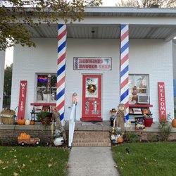Redwings Barber Shop - Look for the Barber pole pillars.