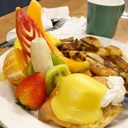 a plate of food with fruit on it