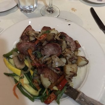 Lassoni Ristorante - Pork chop under a ton of sausage, potatoes, mushrooms, etc. - Italian Near Me - North Arlington, New Jersey Lassoni Ristorante - Pork chop under a ton of sausage, potatoes, mushrooms, etc. - Italian Near Me - North Arlington, New Jersey