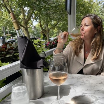 11th Post On Queen - a woman enjoying a glass of wine - Salad Near Me - Niagara-on-the-Lake, Ontario 11th Post On Queen - a woman enjoying a glass of wine - Salad Near Me - Niagara-on-the-Lake, Ontario