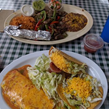 Consuelo's Express - Saturday's special up front and a Beef fajita dinner plate on the background. Really yummy and chips and salsa are complimentary. - Mexican Near Me - Fort Collins, Colorado