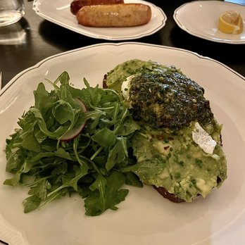 Koloman - Avocado Deluxe (Crushed avocado, poached egg, arugula, shaved radish, cilantro, sourdough) - Austrian Near Me - New York, New York Koloman - Avocado Deluxe (Crushed avocado, poached egg, arugula, shaved radish, cilantro, sourdough) - Austrian Near Me - New York, New York
