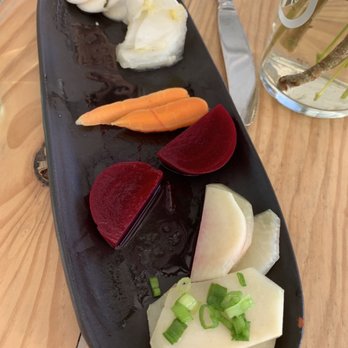 Dillon Beach Coastal Kitchen - Housemade pickles. This night (from bottom) kohlrabi, beet, carrot, cabbage and Japanese pickles - New American Near Me - Dillon Beach, California Dillon Beach Coastal Kitchen - Housemade pickles. This night (from bottom) kohlrabi, beet, carrot, cabbage and Japanese pickles - New American Near Me - Dillon Beach, California