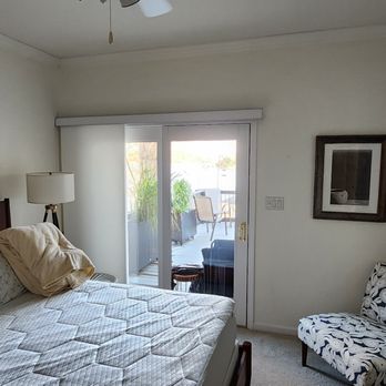 Blinds & Drapes For Less - Slide panels made from roman shade fabrics instead of verticals for sliding glass doors - Shades & Blinds Near Me - Mesquite, Texas