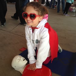 Healthline First Aid - At an American Heart Association even in West Bend Wisconsin, this little Super Girl had some super CPR skills!