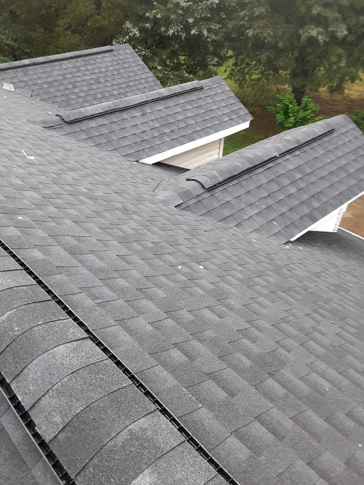 Slide of C & J Roofing