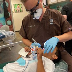Best Bites Dental - Double checking for cavities (he had none) and cracking some jokes