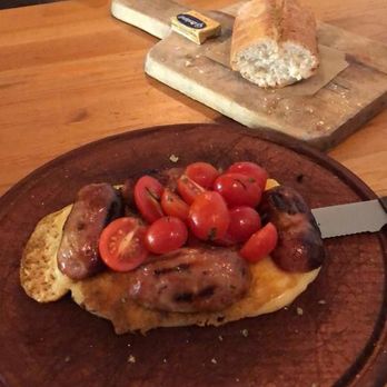 Fiorito - Provoleta con chorizo . semi hard provolone cheese / sausage / tomate / basil - Argentine Near Me - Miami, Florida Fiorito - Provoleta con chorizo . semi hard provolone cheese / sausage / tomate / basil - Argentine Near Me - Miami, Florida