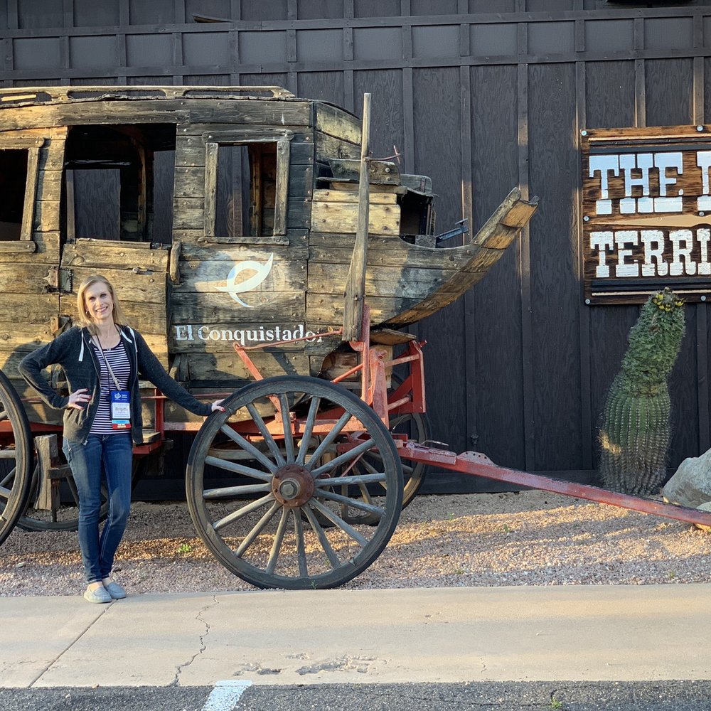 Last Territory Steakhouse - a woman standing next to a wagon - Steakhouses Near Me - Tucson, Arizona Last Territory Steakhouse - a woman standing next to a wagon - Steakhouses Near Me - Tucson, Arizona