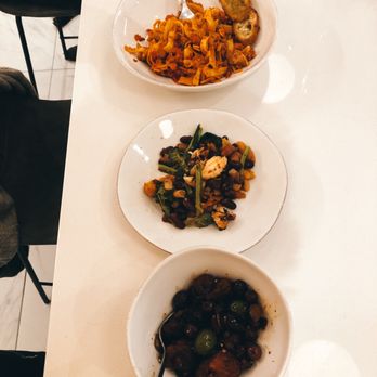 Motorino Enoteca - three bowls of food on a table - Italian Near Me - Woodbridge, Ontario