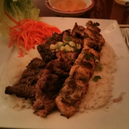 Three meats (beef, pork, chicken) on rice Three meats (beef, pork, chicken) on rice