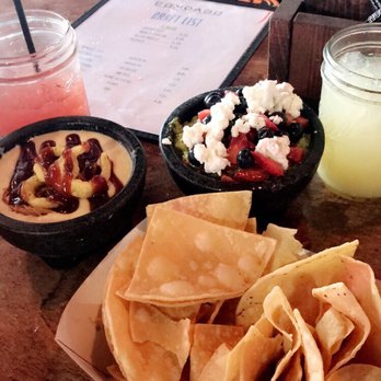 Condado Tacos - July's queso (BBQ jackfruit) & guac (blueberry, strawberry, goat cheese)! Delicious. - Bars Near Me - Cincinnati, Ohio