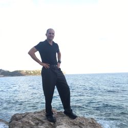 Le Sentier du littoral - Standing on a Rock