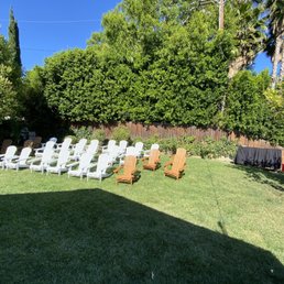 Chairs and bar set up for my party. (The wood color were the extra chairs they brought)
