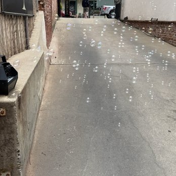 Simply Bubbles - Simply bubbles floating down the alley way - Champagne Bars Near Me - Sutter Creek, California