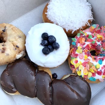 Painted Dough - From left to right: Blueberry Donut, Chocolate Twist, Coconut Creme, Fruity Pebbles Breakfast Cereal. - Donuts Near Me - Chino, California Painted Dough - From left to right: Blueberry Donut, Chocolate Twist, Coconut Creme, Fruity Pebbles Breakfast Cereal. - Donuts Near Me - Chino, California