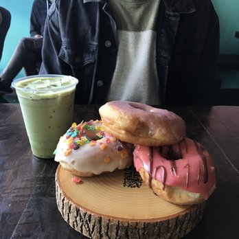 Dun-Well Doughnuts - Blueberry , Fruity Pebbles, Strawberry Chocolate Donuts with an Iced Matcha Latte - Donuts Near Me - Brooklyn, New York