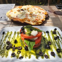 Caprese Salad & Albino* pizza (pears, almonds, bacon & mozzarella)