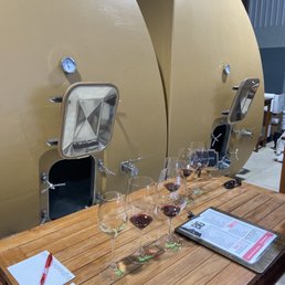 wine glasses on a wooden table wine glasses on a wooden table