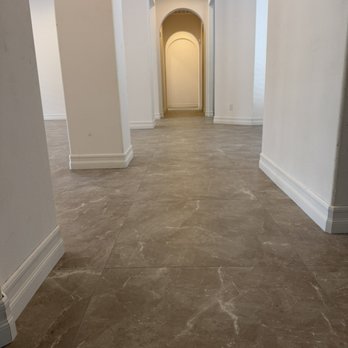 DLT Remodeling - 32x32 inch porcelain tile and baseboard installation - Tiling Near Me DLT Remodeling - 32x32 inch porcelain tile and baseboard installation - Tiling Near Me
