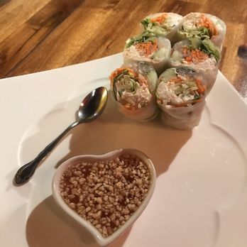 Mali Thai Bistro - Mali Thai Spring Rolls - delicious crab and cream cheese rolls with sweet chili sauce topped with roasted peanuts. - Thai Near Me - Lee's Summit, Missouri Mali Thai Bistro - Mali Thai Spring Rolls - delicious crab and cream cheese rolls with sweet chili sauce topped with roasted peanuts. - Thai Near Me - Lee's Summit, Missouri