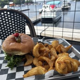 Burger & curly fries cooked to perfection Burger & curly fries cooked to perfection