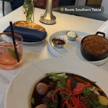Roots Southern Table - Braised pork cheeks, scallion pancake, cornbread. - Southern Near Me - Farmers Branch, Texas