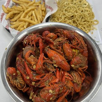 Crawfish Cafe - The signature: garlic butter and Cajun flavor - Seafood Near Me - Houston, Texas Crawfish Cafe - The signature: garlic butter and Cajun flavor - Seafood Near Me - Houston, Texas