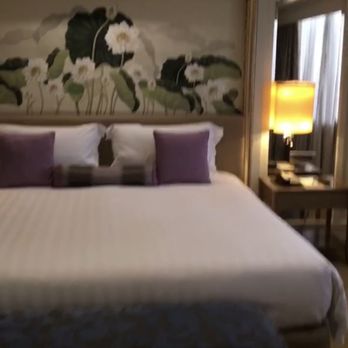 Dusit Thani Manila - Bedroom w sliding doors separating living room and bedroom. - Hotels Near Me - Makati, NCR