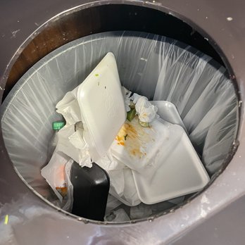Tacos 352 - Garbage full of styrofoam trays and single-use plastic bottles from dine in customers. - Tacos Near Me - Gainesville, Florida Tacos 352 - Garbage full of styrofoam trays and single-use plastic bottles from dine in customers. - Tacos Near Me - Gainesville, Florida