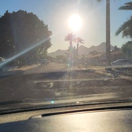 Streaky and pretty dirty windshield with dashboard cleaner overspray Streaky and pretty dirty windshield with dashboard cleaner overspray
