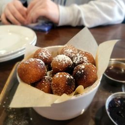 Holey Donuts with blueberry sauce and chocolate sauce