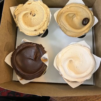 Baked & Wired - Top left: pretty bitchin' cupcake Top right: dirty chai cupcake Bottom left: vanilla satin cupcake Bottom right: strawberry cupcake - Bakeries Near Me - Washington, DC, District of Columbia